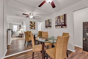 Canton apartment for rent - A dining room with a glass table and chairs.