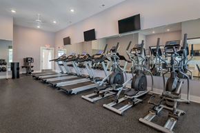 Columbus apartment for rent - a row of treadmills and other exercise equipment in a gym