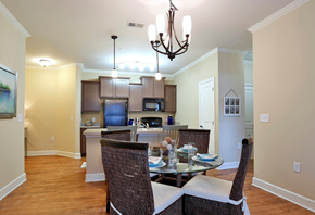 Myrtle Beach apartment for rent - A dining room with a glass table and chairs.