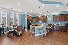 Myrtle Beach apartment for rent - A kitchen with a dining table and chairs.
