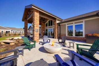 Pondside outdoor veranda with fire pits