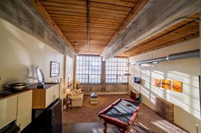South Bend apartment for rent - A room with a pool table and a television.