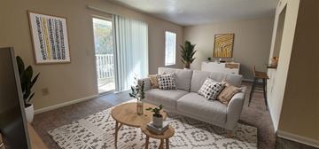 Asheville apartment for rent - a living room with a couch and a coffee table