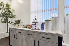 Placentia apartment for rent - Refreshment station with bottled water and snacks at ELEVATE Apartments HOMES, Placentia, California