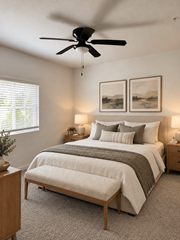 Lakeland apartment for rent - A bedroom with a large bed and a ceiling fan.