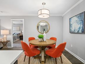 Summerville apartment for rent - A dining room with a round table and chairs.