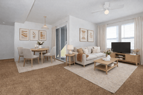 El Paso apartment for rent - A living room with a sofa, chairs, and a coffee table.
