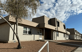 El Paso apartment for rent - A row of houses with a tree in front of the first one.