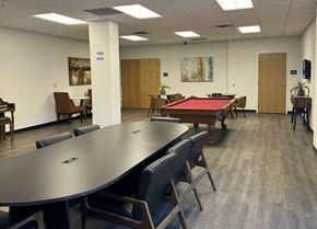El Paso apartment for rent - A conference room with a pool table and chairs.