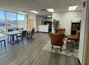 El Paso apartment for rent - A conference room with a long table and chairs.