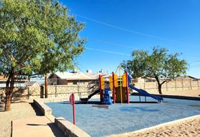 El Paso apartment for rent - A playground with a blue water feature and a slide.