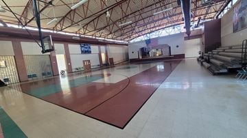 El Paso apartment for rent - A gym with a basketball court and a basketball hoop.