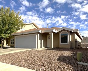 El Paso apartment for rent - A house with a garage and a driveway.