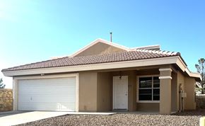 El Paso apartment for rent - A house with a brown roof and a white garage door.