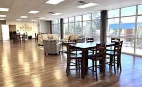 El Paso apartment for rent - A large room with a long table and chairs.
