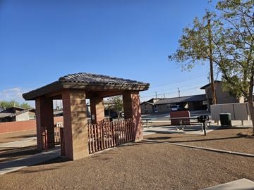 El Paso apartment for rent - A gazebo-like structure sits in the middle of a playground.