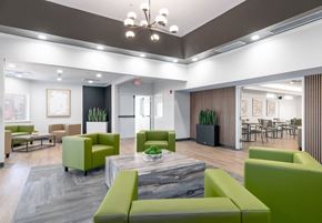 El Paso apartment for rent - A modern living room with green and grey furniture.