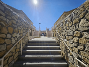El Paso apartment for rent - A stone staircase leads up to a building entrance.
