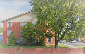 Louisville apartment for rent - a red brick house with a tree in front of it