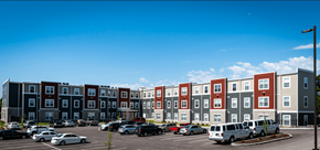 St. Louis apartment for rent - a rendering of an apartment building in a parking lot with cars