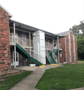 Greenville apartment for rent - the outside of an apartment building with two sets of stairs