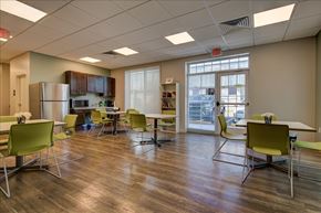Jacksonville apartment for rent - A room with a table and chairs in it.
