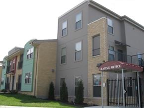St. Louis apartment for rent - A multi-story building with a leasing office on the ground floor.