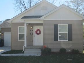 St. Louis apartment for rent - A house with a wreath on the door.