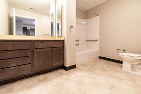 St. Louis apartment for rent - a bathroom with a toilet and a sink and a bath tub