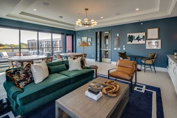 Sky lounge with terrace & firepit overlooking amenity deck