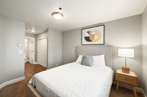 San Leandro apartment for rent - a bedroom with a bed and a nightstand