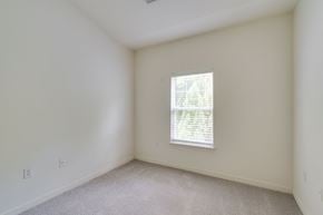 Lynchburg apartment for rent - a bedroom with white walls and a window