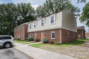 Portsmouth apartment for rent - an apartment building with a car parked in front of it