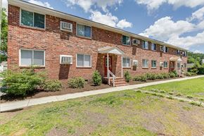 Norfolk apartment for rent - a brick building with a sidewalk in front of it