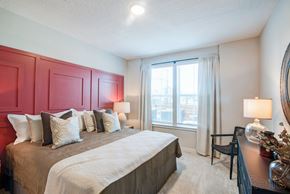Orlando apartment for rent - Bedroom with double window and ceiling fan at Tapestry Nona in Orlando, FL