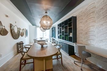 Conference room with tables and work space.