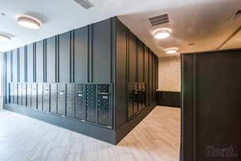 Mailroom with package lockers.