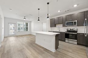Mcdonough apartment for rent - open floor plan with large kitchen island at Tapestry Overbrook in  McDonough, Georgia