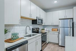 Spartanburg apartment for rent - Modern kitchen with subway tile backsplash at Bon Haven Apartments in Spartanburg, SC