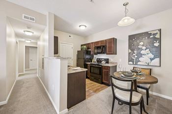 Modern black kitchen appliances with built-in microwaves