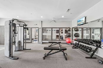 24-Hour fitness center with free weights