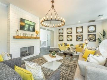 Birmingham apartment for rent - a living room with couches and a chandelier
