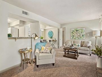 Daphne apartment for rent - a living room with a couch and a table