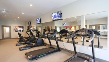 24-Hour fitness center with free weights
