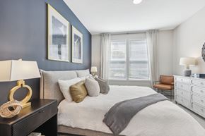 Apollo Beach apartment for rent - the preserve at ballantyne commons bedroom with large bed and windows