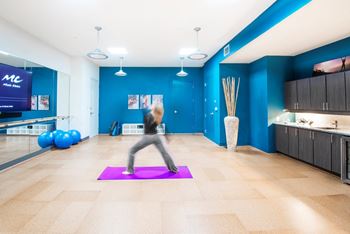 Fitness studio with yoga mat and exercise balls