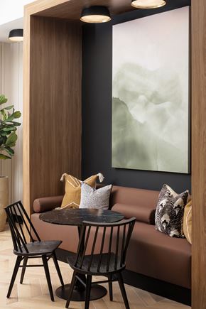 Broomfield apartment for rent - A modern dining area with a round table and two chairs.