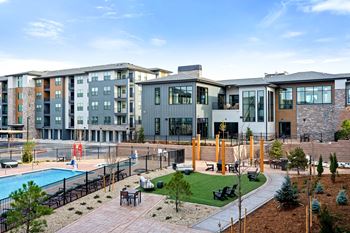 Resort-style saltwater pool with hot tub and expansive sundeck