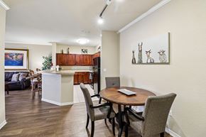Ormond Beach apartment for rent - A dining room with a table and chairs.