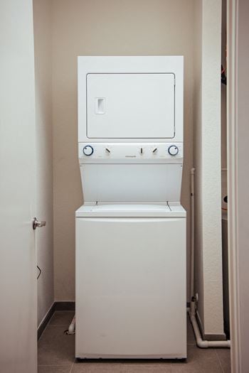 A washer and dryer in a closet in a home